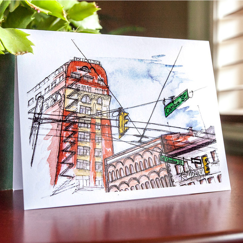 Watercolor and ink card by Katrina Dawn of the Cambie and West Cordova intersection in Vancouver, featuring historic brick buildings and street signage