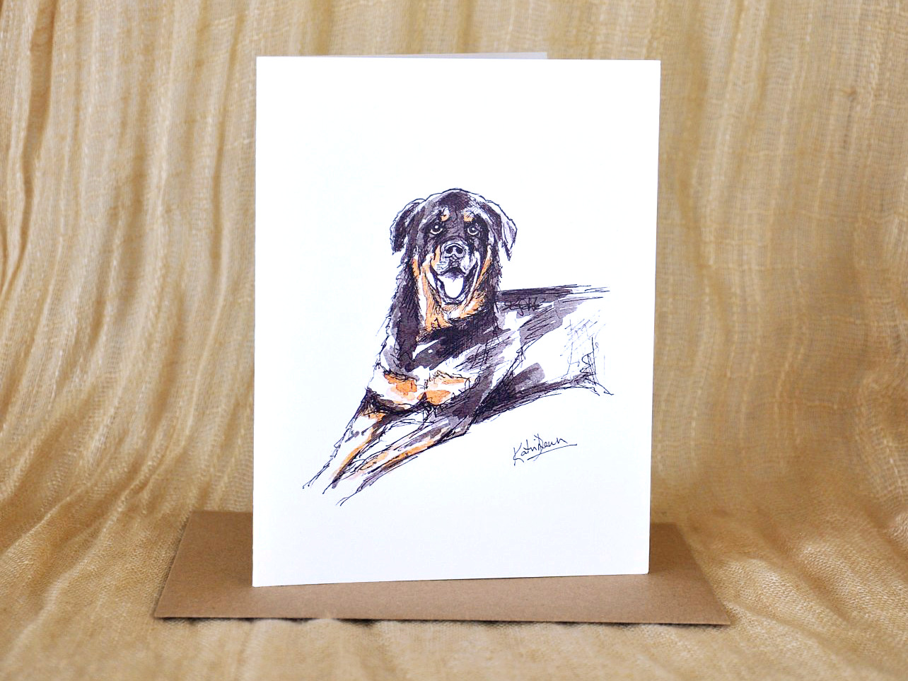 KatrinaDawn watercolour and ink pet portrait card of Leo the dog, shown with a kraft paper envelope